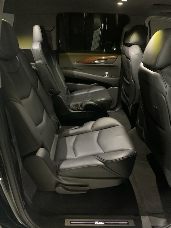 Seats: Up to 5 passenger *Ideal for 4 passenger*  Vehicle Color: Black  Amenities:  USB Charging Port Rear Climate Control Rear Audio Control Rear Storage  Captains Seat X2